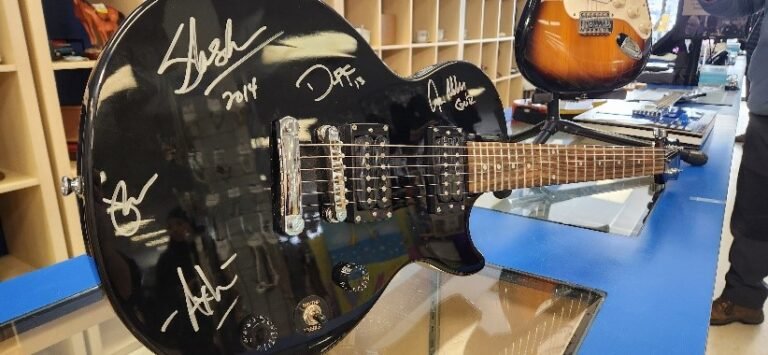 Guitar with Guns N’ Roses autographs to be auctioned off by Sherwood Park Goodwill