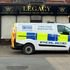 Man and woman arrested after 34 bodies removed from funeral parlour in police raid