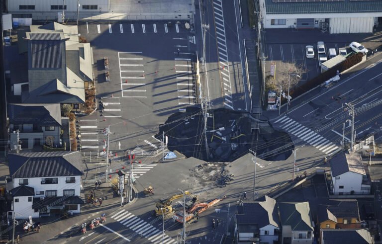 Fears grow for Japan truck driver swallowed by sinkhole as rescue enters 4th day