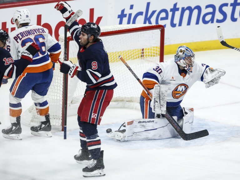 Jets top Islanders 4-3 for eighth straight win heading into break