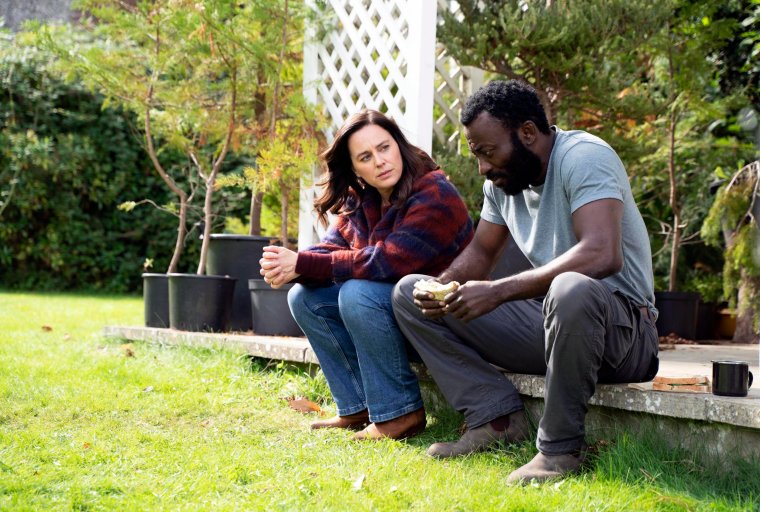 JODIE, (JILL HALFPENNY) AND ADE, (BABS OLUSANMOKUN)