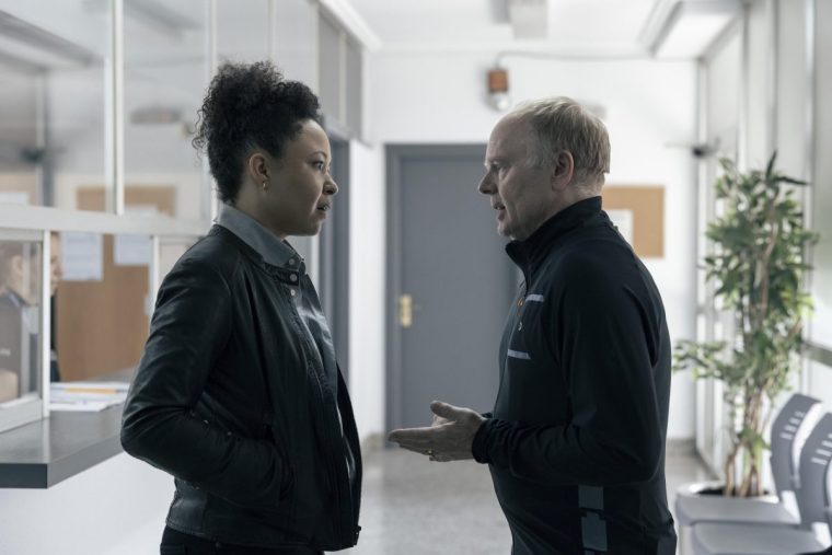 Huw (left) meets Jenny (right) at the police station UW (JASON WATKINS) & JENNY (AMBER JAMES);