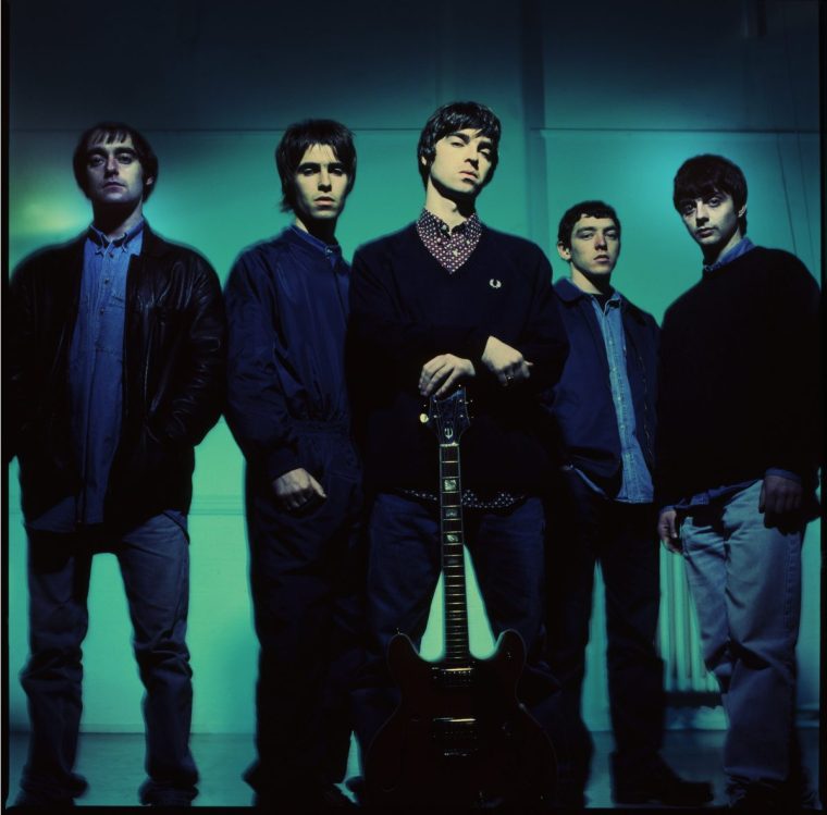 Oasis photographed in Manchester in 1993 (left to right):  Paul Arthurs (aka Bonehead), Liam Gallagher, Noel Gallagher, Tony McCarroll, Paul McGuigan. (Photo: James Fry/ Getty)