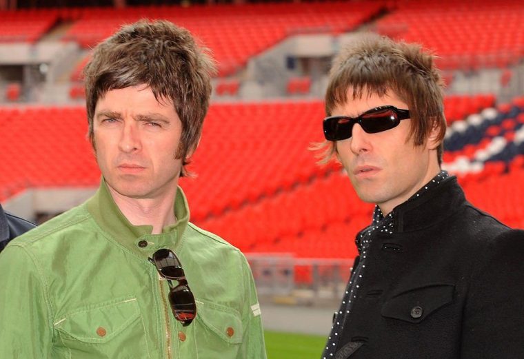 Noel Gallagher (left) and Liam Gallagher at Wembley Stadium in October 2008. Months later, the band would split (Photo: by Samir Hussein / Getty)