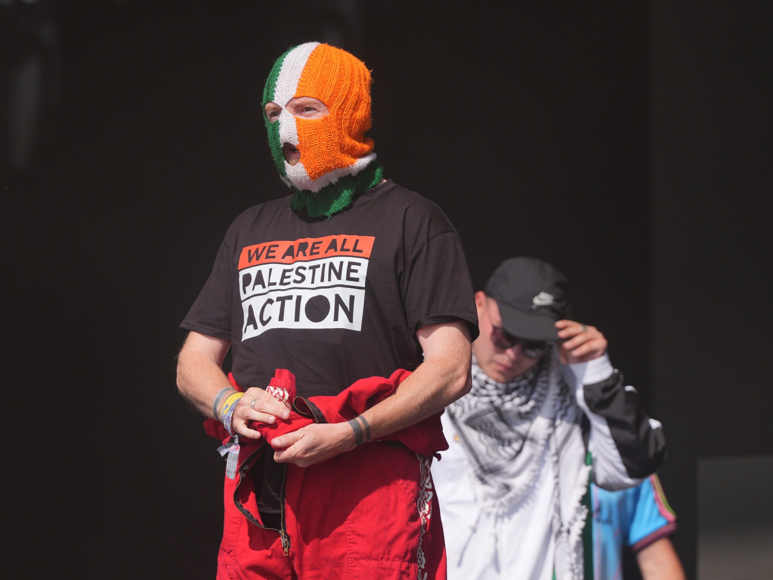 JJ OâDochartaigh performing during Kneecapâs set on the West Holts Stage