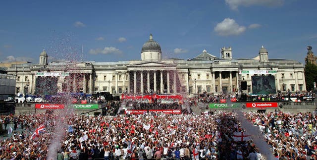 The England cricket team enjoy the Ashes 2005 victory parade in Trafalgar Square, London