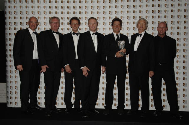 Mark Nicholas, third right, with the BAFTA awarded to Channel Four's 2005 Ashes coverage. Nicholas is flanked by comedian Rory Bremner, centre, who presented the award, and co-commentators Richie Benaud, second right, and Simon Hughes, right