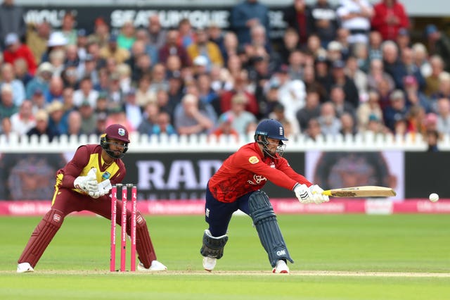 England's Ben Duckett reverse-sweeps during his innings of 30 against the West Indies