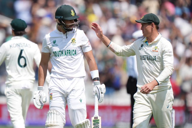 South Africa's Aiden Markram, left, is congratulated by Australia's Marnus Labuschagne as he leaves the pitch after his innings of 136 at Lord's
