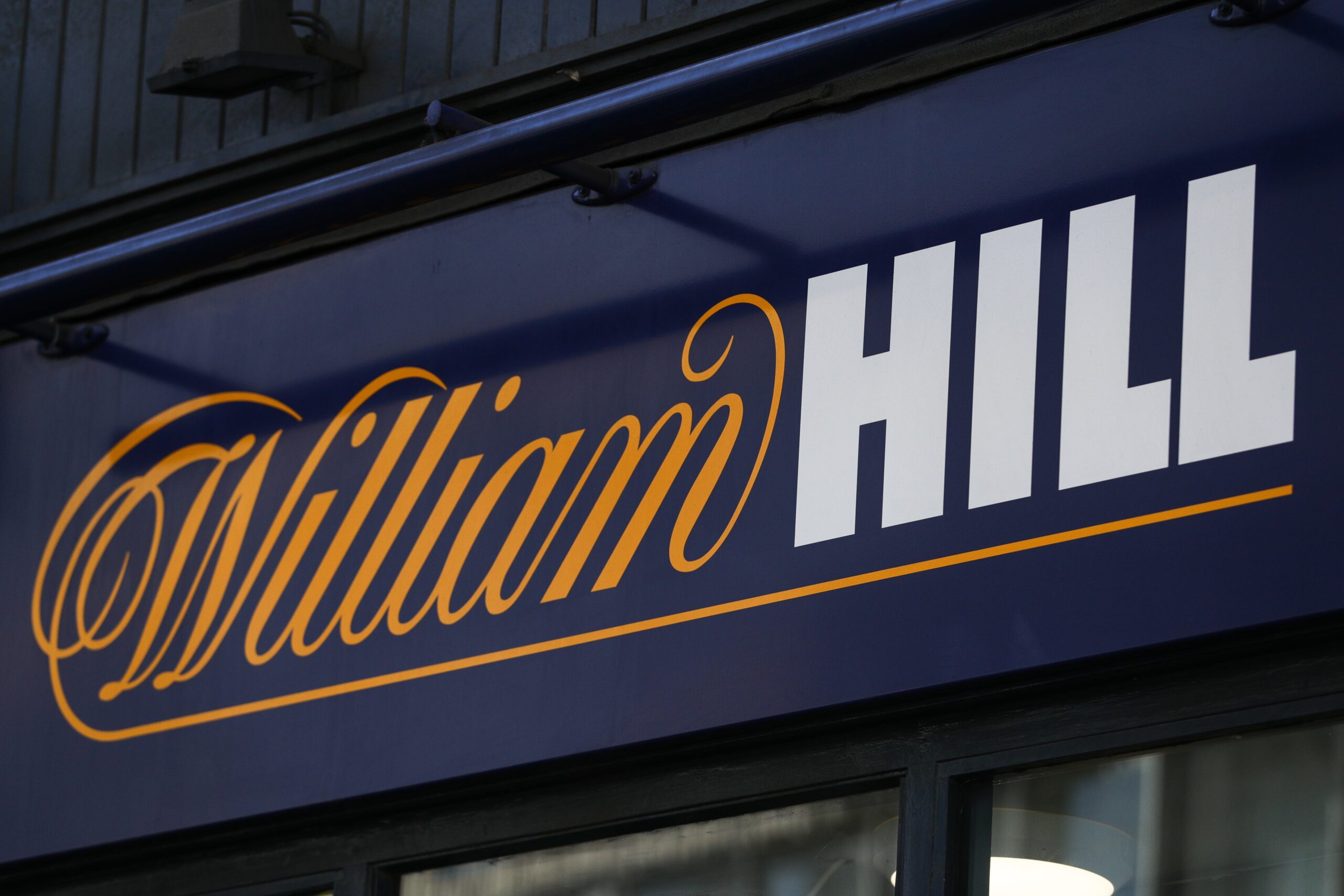 William Hill has been instructed to pay nearly £70,000 to a former executive