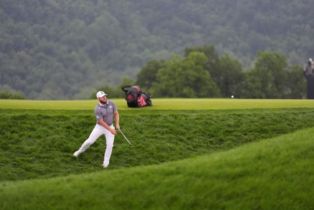 Tyrrell Hatton hits a shot