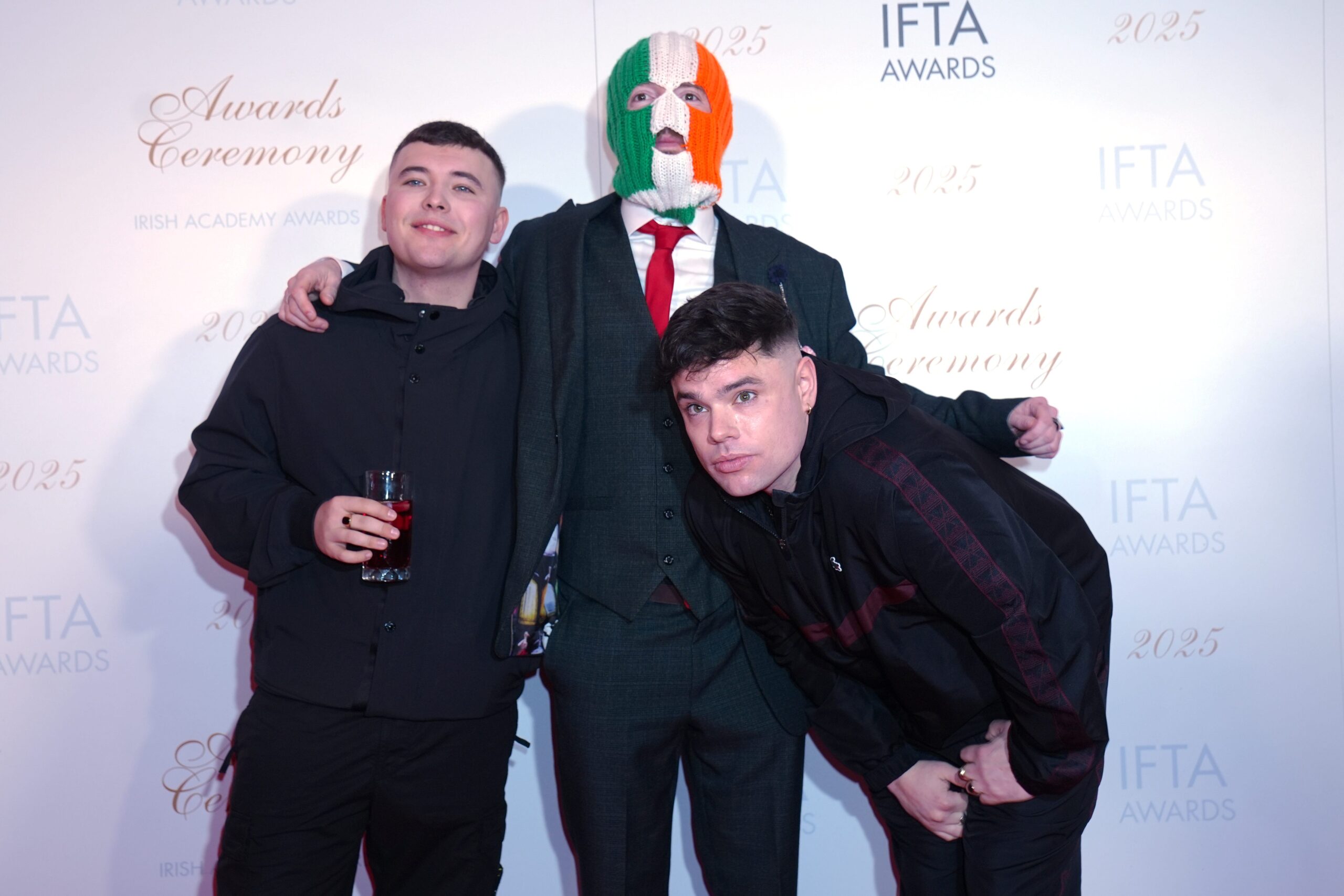 Members of Kneecap, Liam Og Members of Kneecap, Liam Og O Hannaidh (Mo Chara), JJ O Dochartaigh (DJ Provai), and Naoise O Caireallain (Moglai Bap)