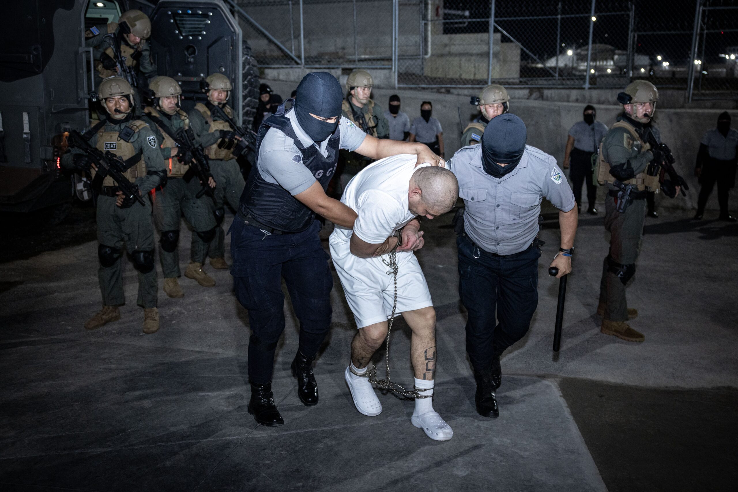 A detainee is led into El Salvador’s CECOT prison