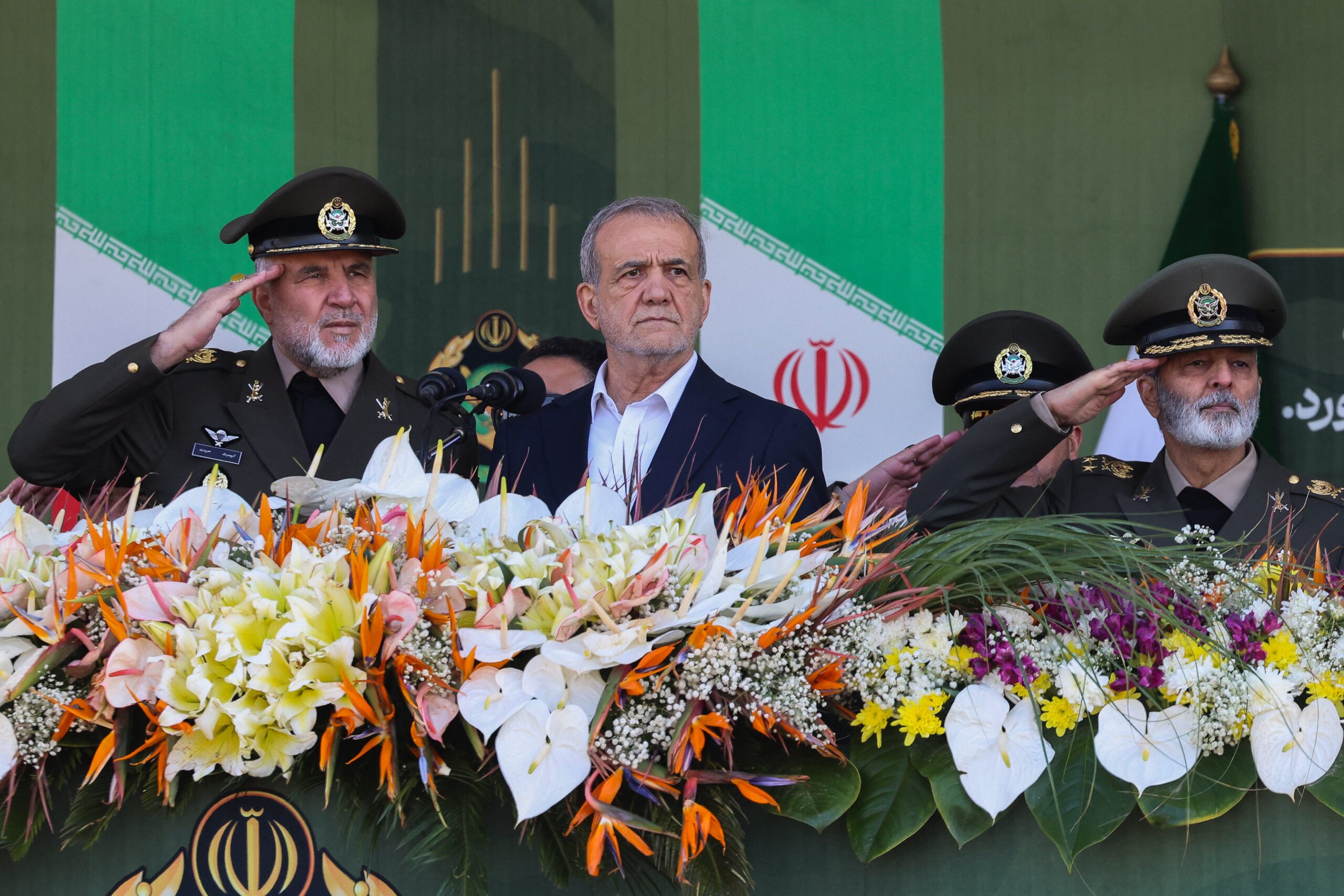 Iran's president Masoud Pezeshkian watches a military parade during a ceremony marking the country's annual Army Day in Tehran