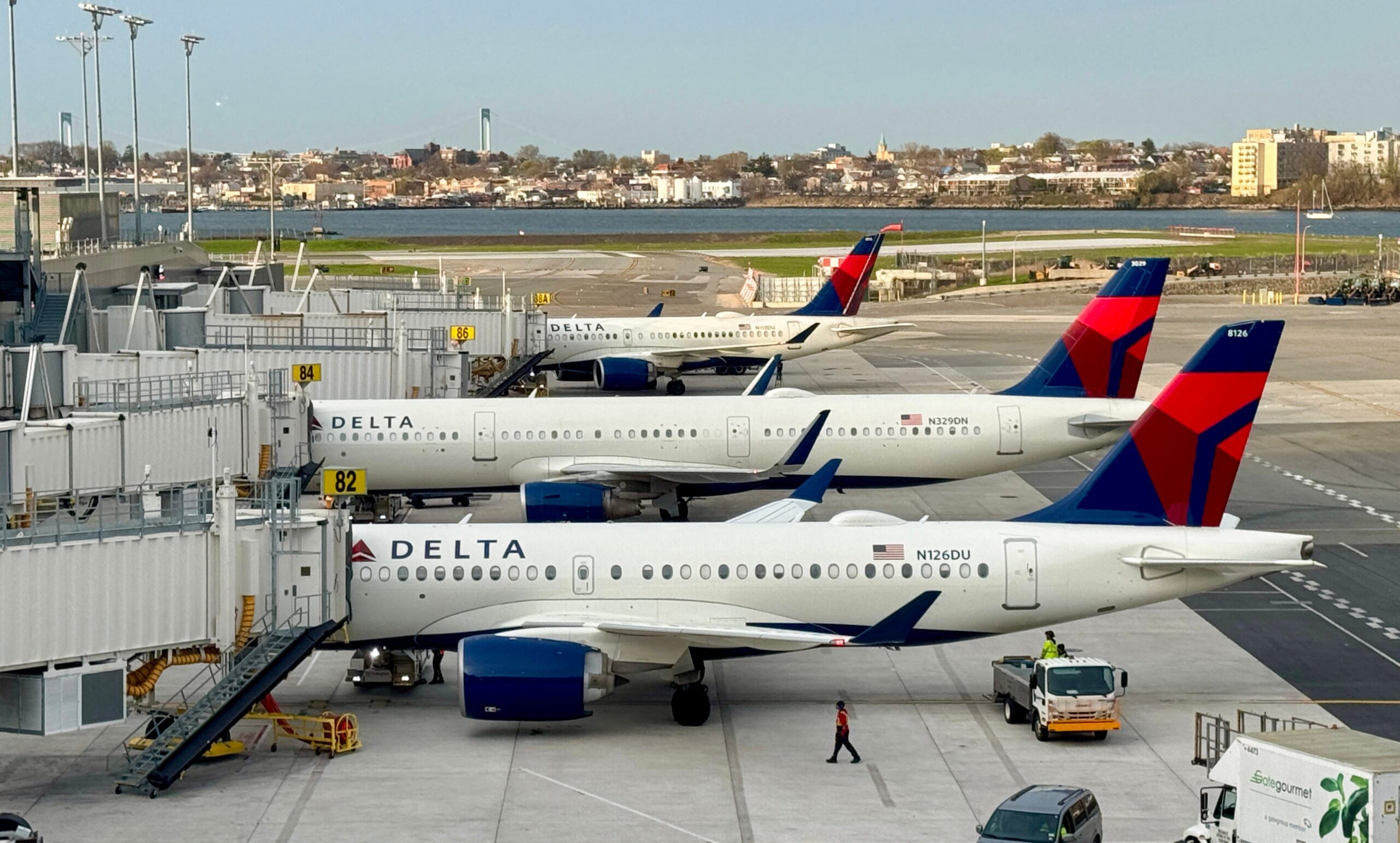 Delta Air Lines planes sit at LaGuardia airport, in New York