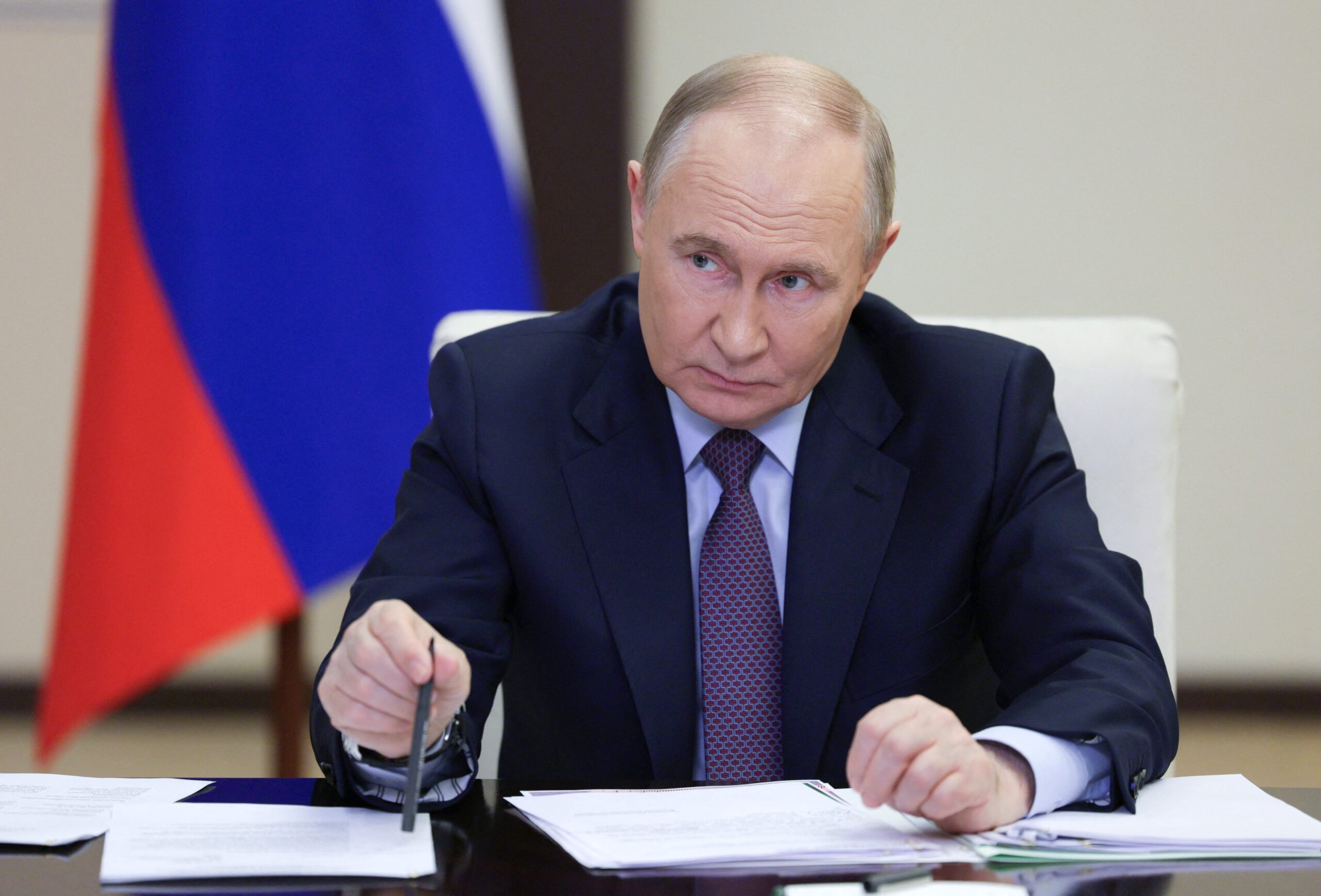 Russia's president Vladimir Putin chairs a meeting on Russia's language policy at the Novo-Ogaryovo state residence outside Moscow
