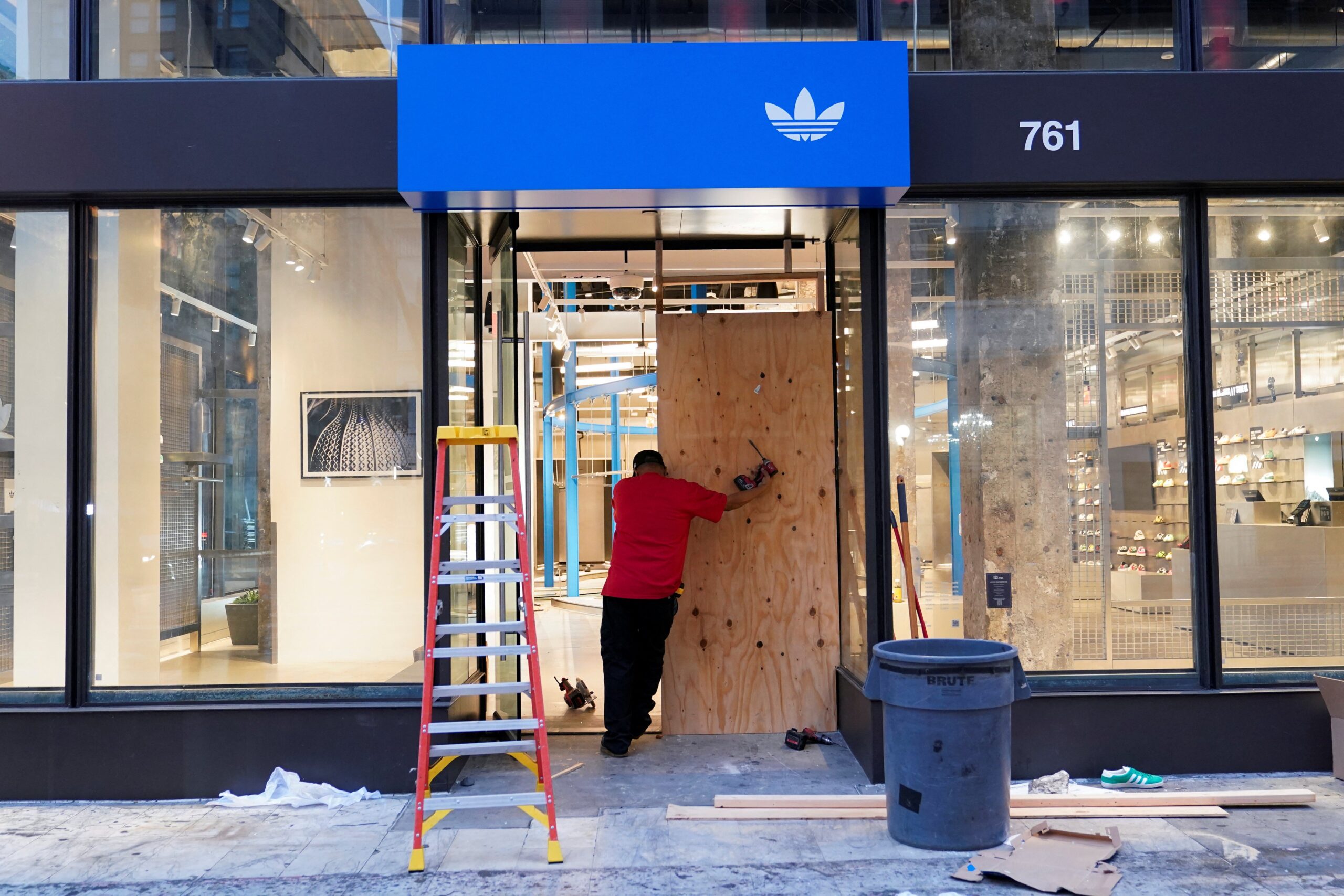 An Adidas store was among several burglarized on Monday evening as protests continued for a fourth day
