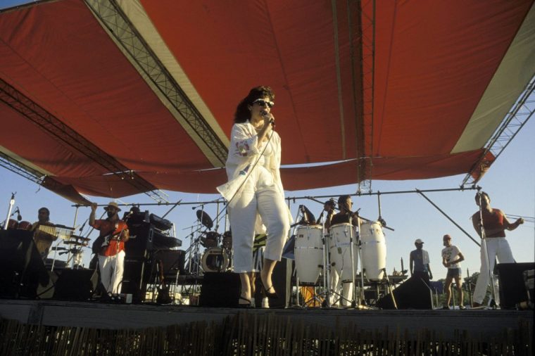Gloria Estefan with the Miami Sound Machine at New Orleans Jazz Festival in 1985 (Photo: David Redfern/Redferns)