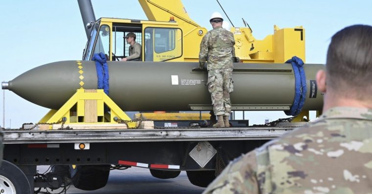 FILE - In this photo released by the U.S. Air Force on May 2, 2023, airmen look at a GBU-57, or the Massive Ordnance Penetrator bomb, at Whiteman Air Base in Missouri.(U.S. Air Force via AP, File)
