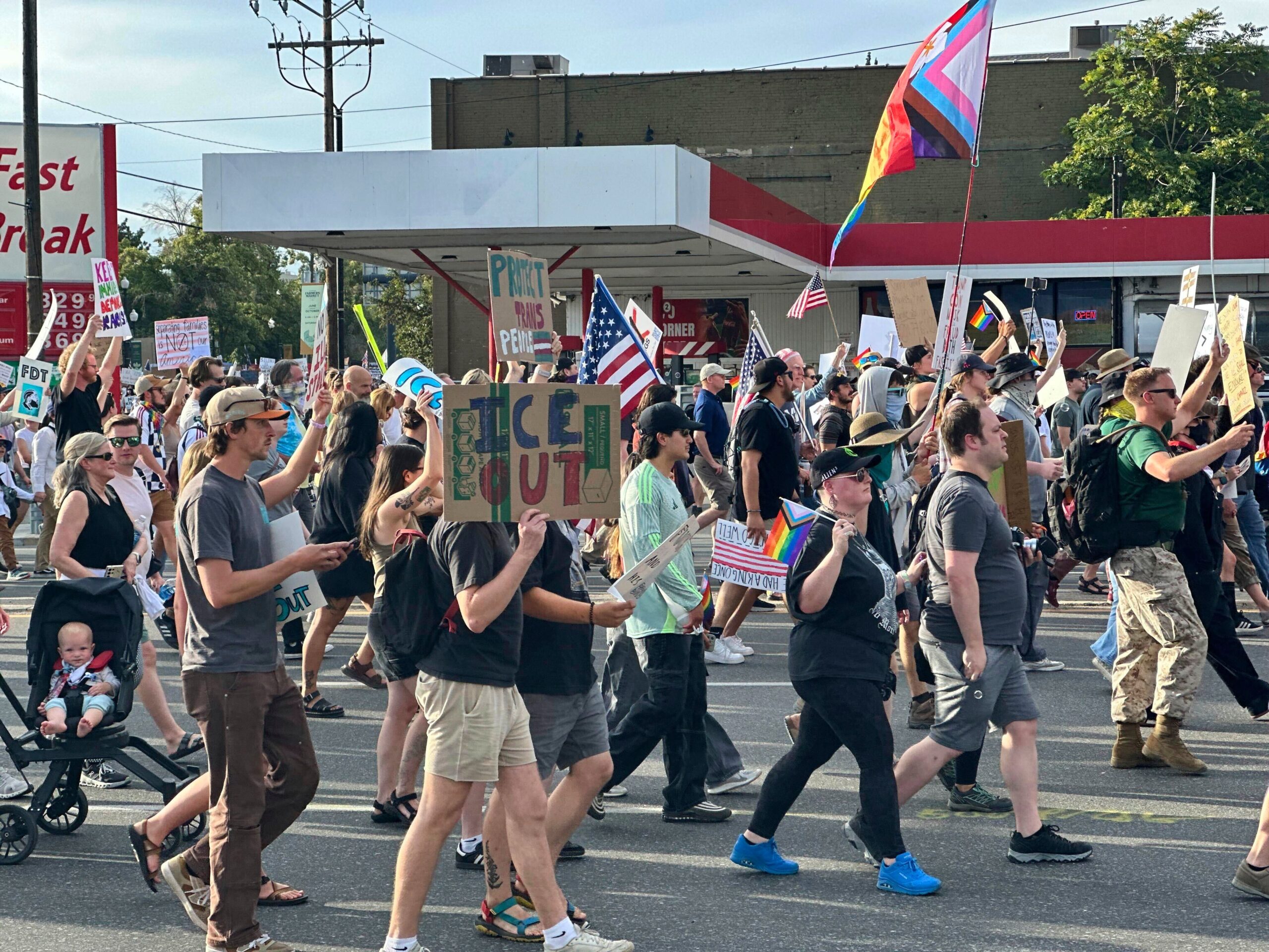 Police say victim was caught in cross-fire as potential event security shot at man who allegedly ran toward crowd with rifle at Salt Lake City ‘No Kings’ protest