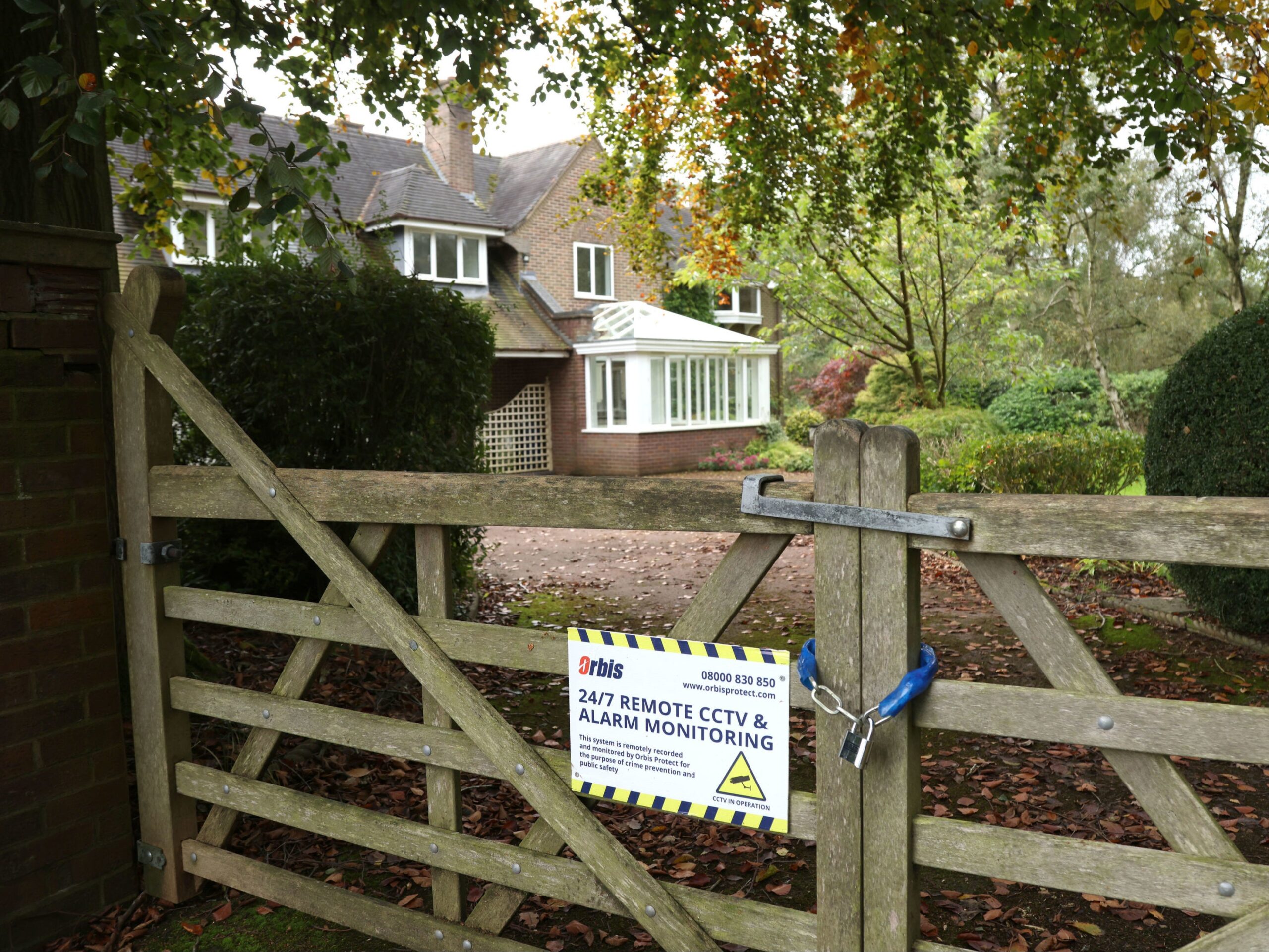 A padlock on the gates of a house on Heath Road, Whitmore Heath in Staffordshire, where many homes have been purchased for HS2