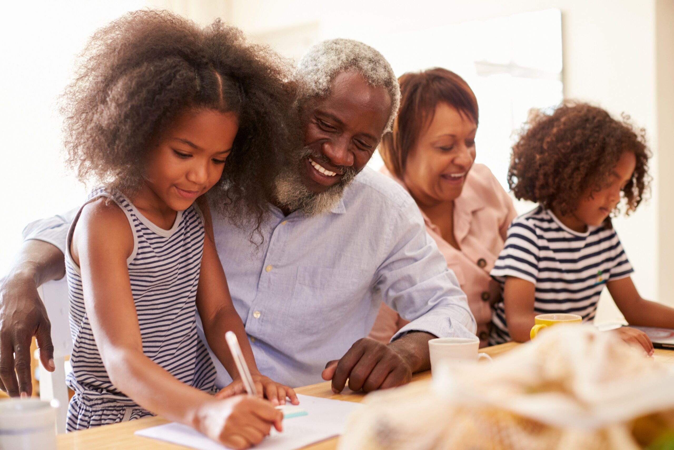 According to a survey, 53 per cent of grandparents are set to step in and look after their grandchildren this summer, spending more than £21 per day on each child on average (Alamy/PA)
