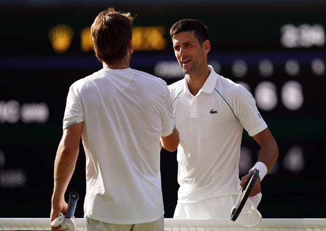 Novak Djokovic, right, celebrates victory over Cameron Norrie in 2022