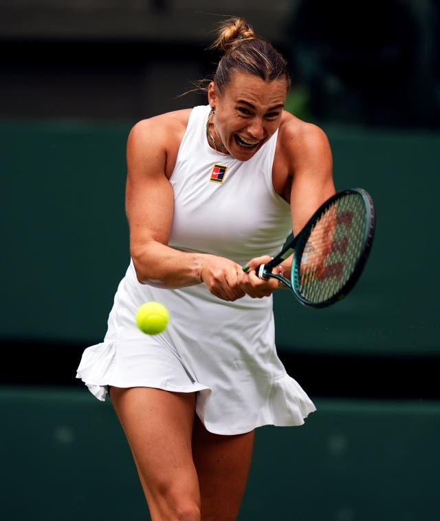 Aryna Sabalenka hits a backhand