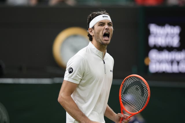 Taylor Fritz celebrates at Wimbledon
