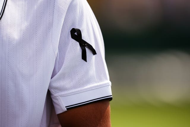 Francisco Cabral wearing a black ribbon on his sleeve