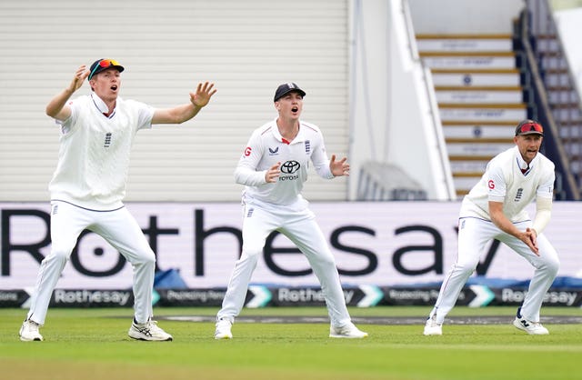 England’s Zak Crawley (left), Harry Brook and Joe Root (right) on day three