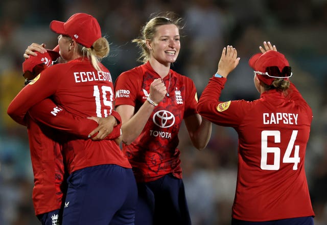 Lauren Bell celebrates the final wicket