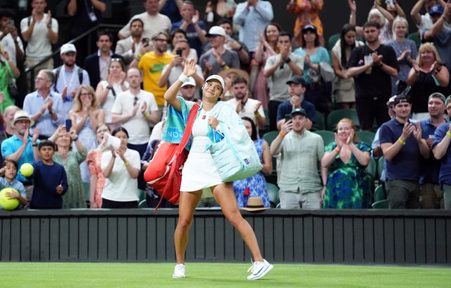 Emma Raducanu waves to the Centre Court crowd