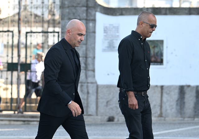 Portugal national team manager Roberto Martinez (left) arrives at the funeral of Diogo Jota