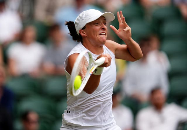 Iga Swiatek hits a forehand