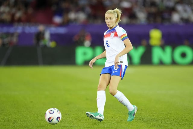England's Leah Williamson passes the ball during a game