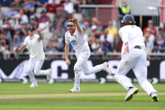 Liam Dawson (centre) celebrates the wicket of India’s Yashasvi Jaiswal