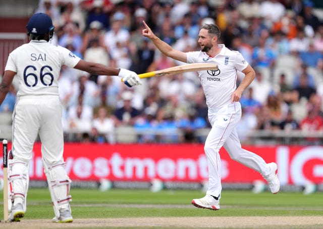 England’s Chris Woakes, right, celebrates the wicket of India’s Sai Sudharsan, left