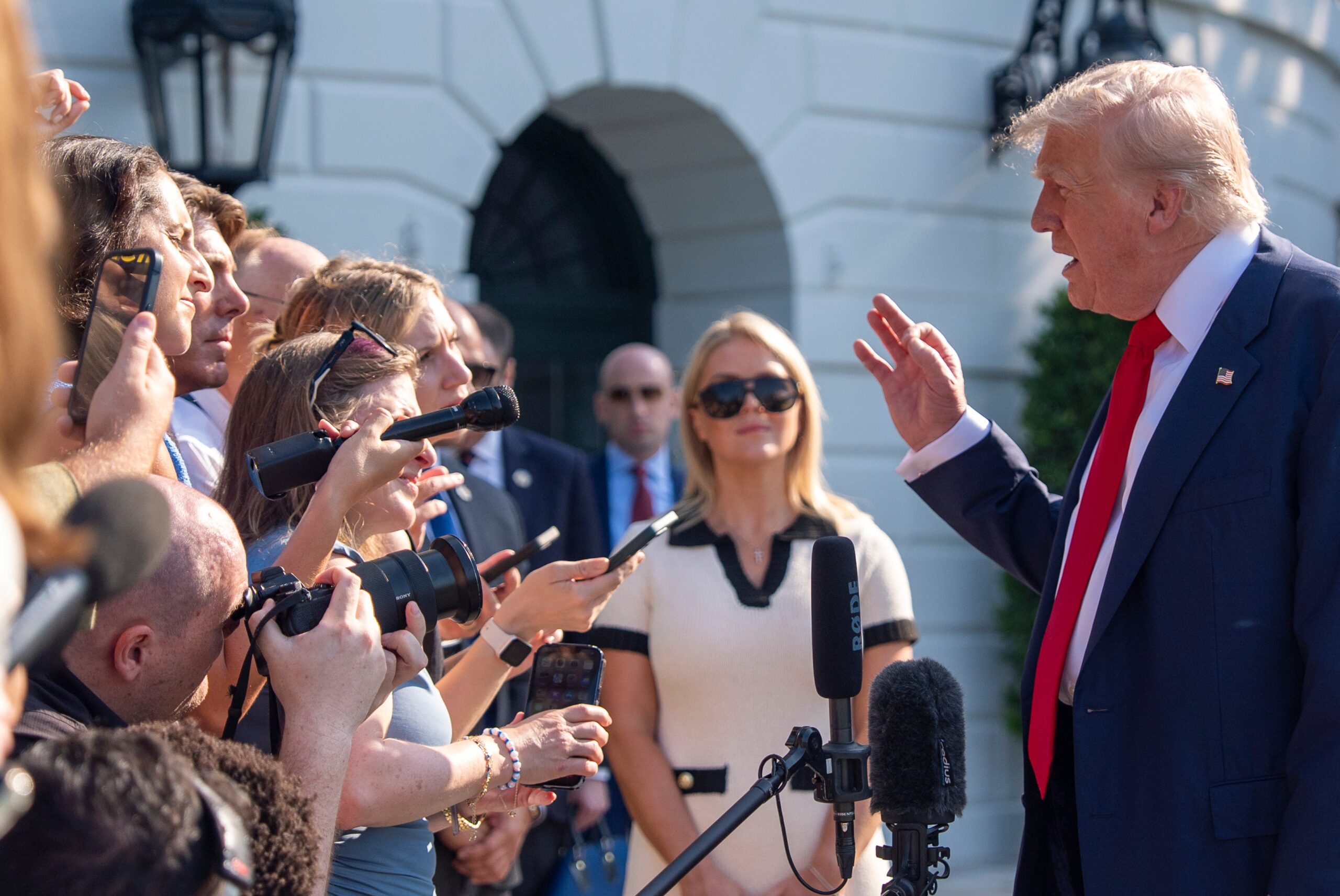 US President Donald Trump speaks to reporters before departing on Marine One from the South Lawn of the White House in Washington (Alex Brandon/AP)