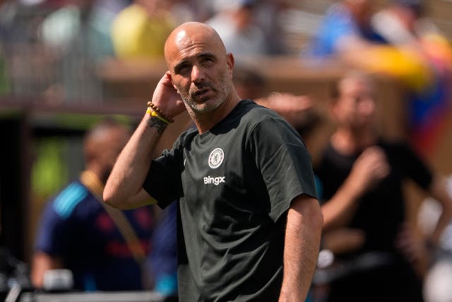 Chelsea head coach Enzo Maresca scratches the back of his head