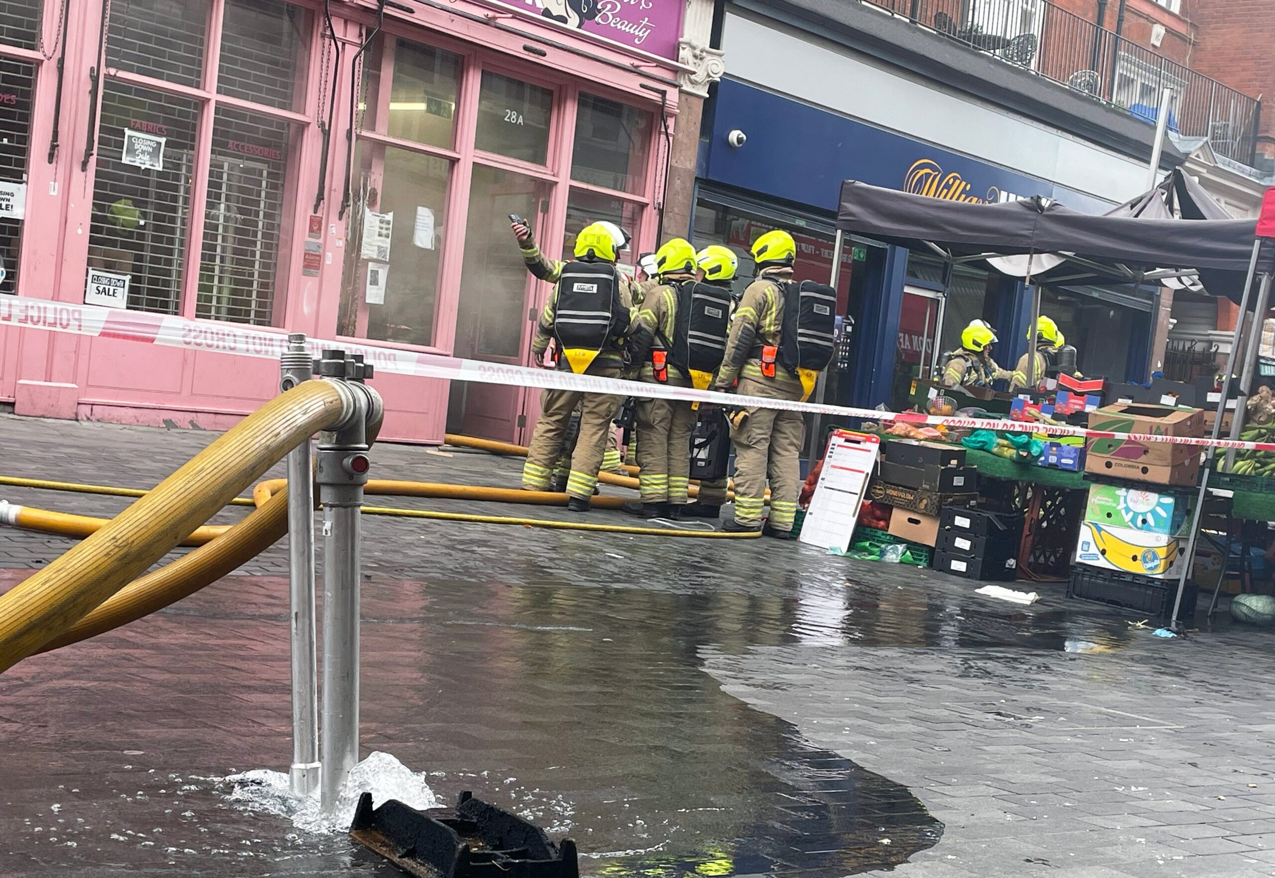 The fire appears to have started in a storage area behind the busy shopping street