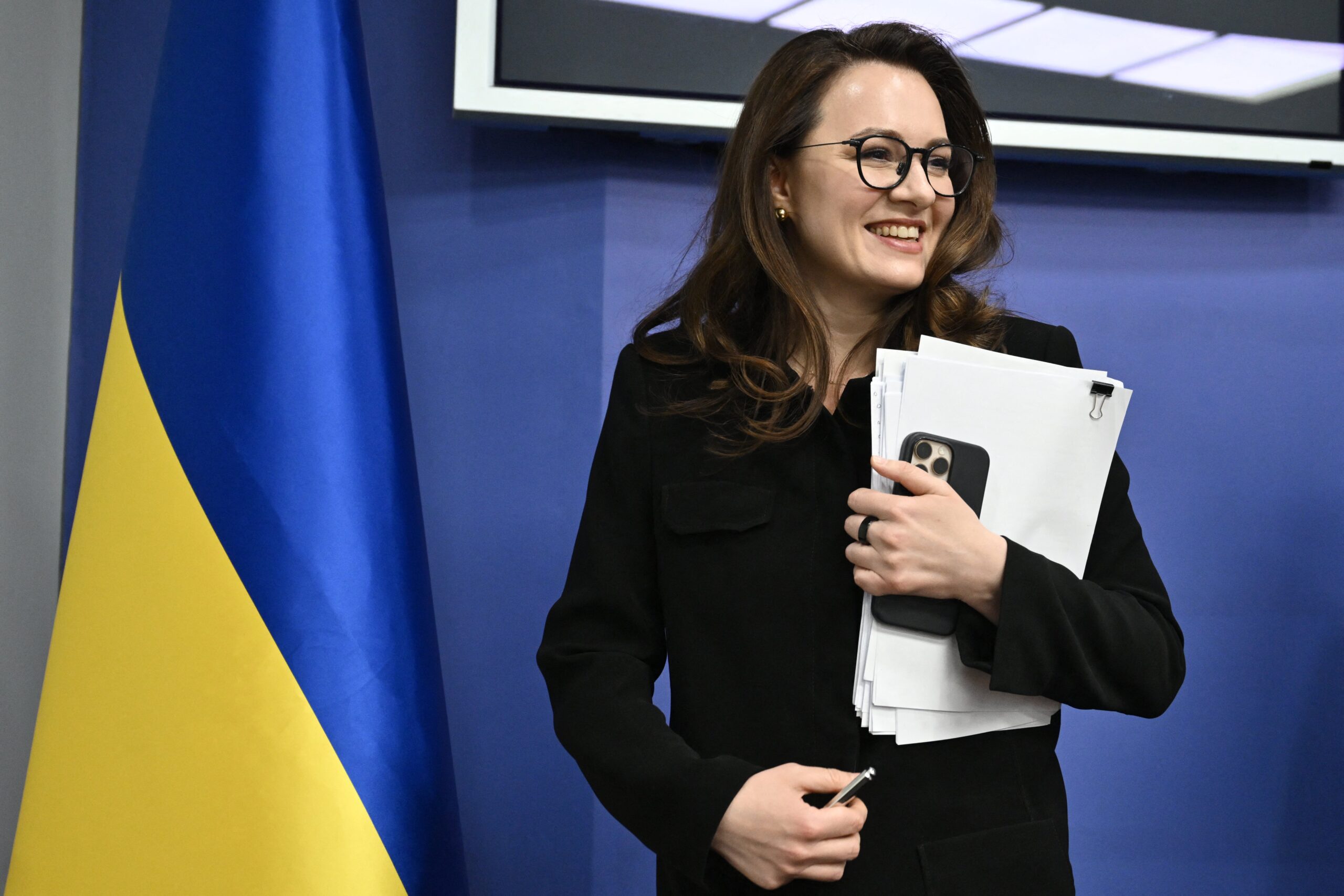 Ukraine's economy minister and first deputy prime minister Yulia Svyrydenko leaves a press conference in Kyiv
