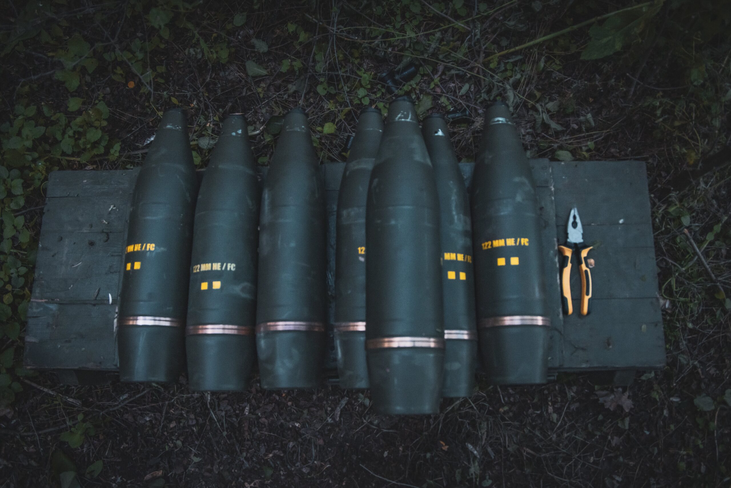 Projectiles used by the artillery unit for combat work as Ukrainian forces with the 117th territorial defense brigade operate an artillery position in the Sumy region