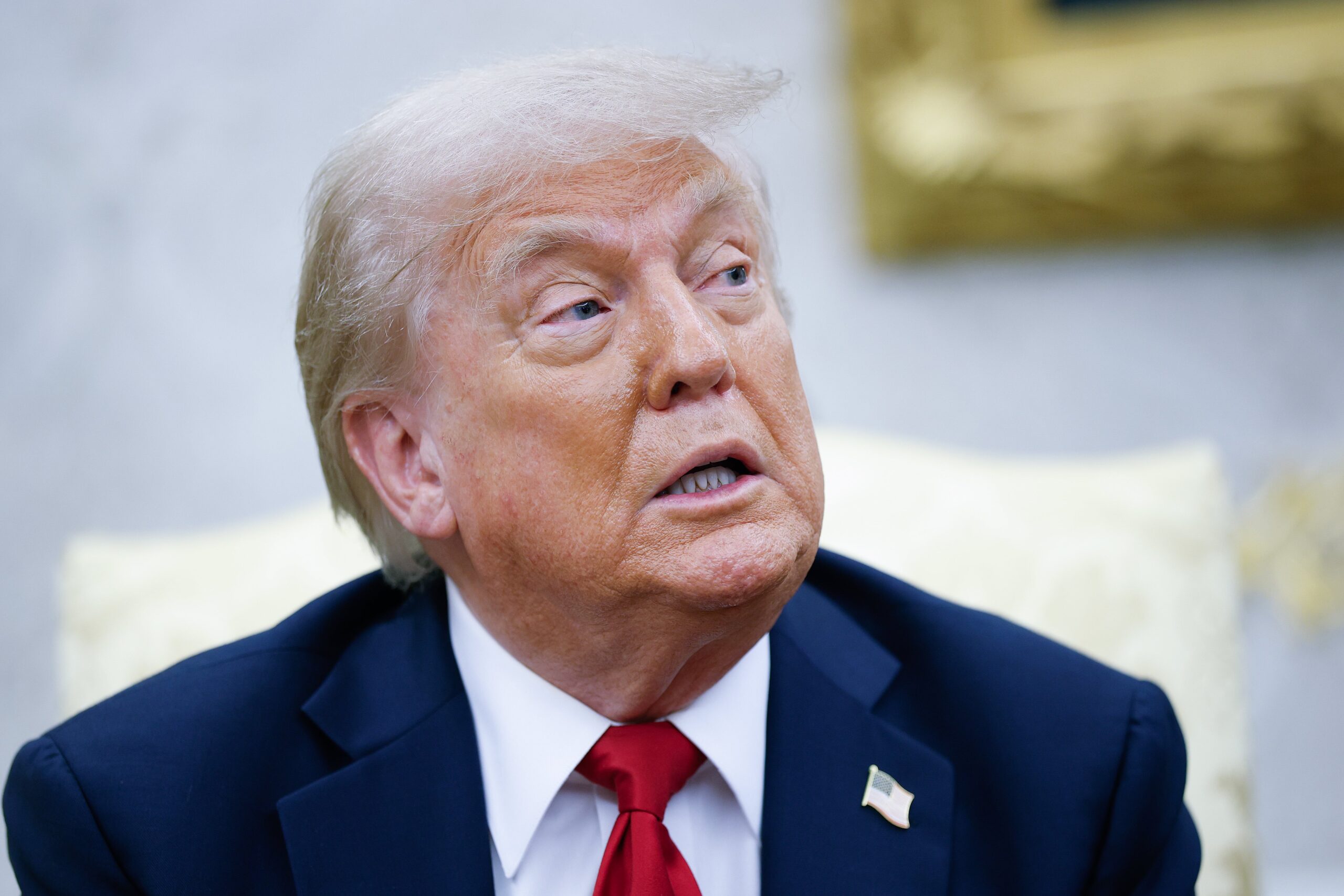 Donald Trump answers questions from reporters while meeting with Nato secretary general Mark Rutte in the Oval Office at the White House