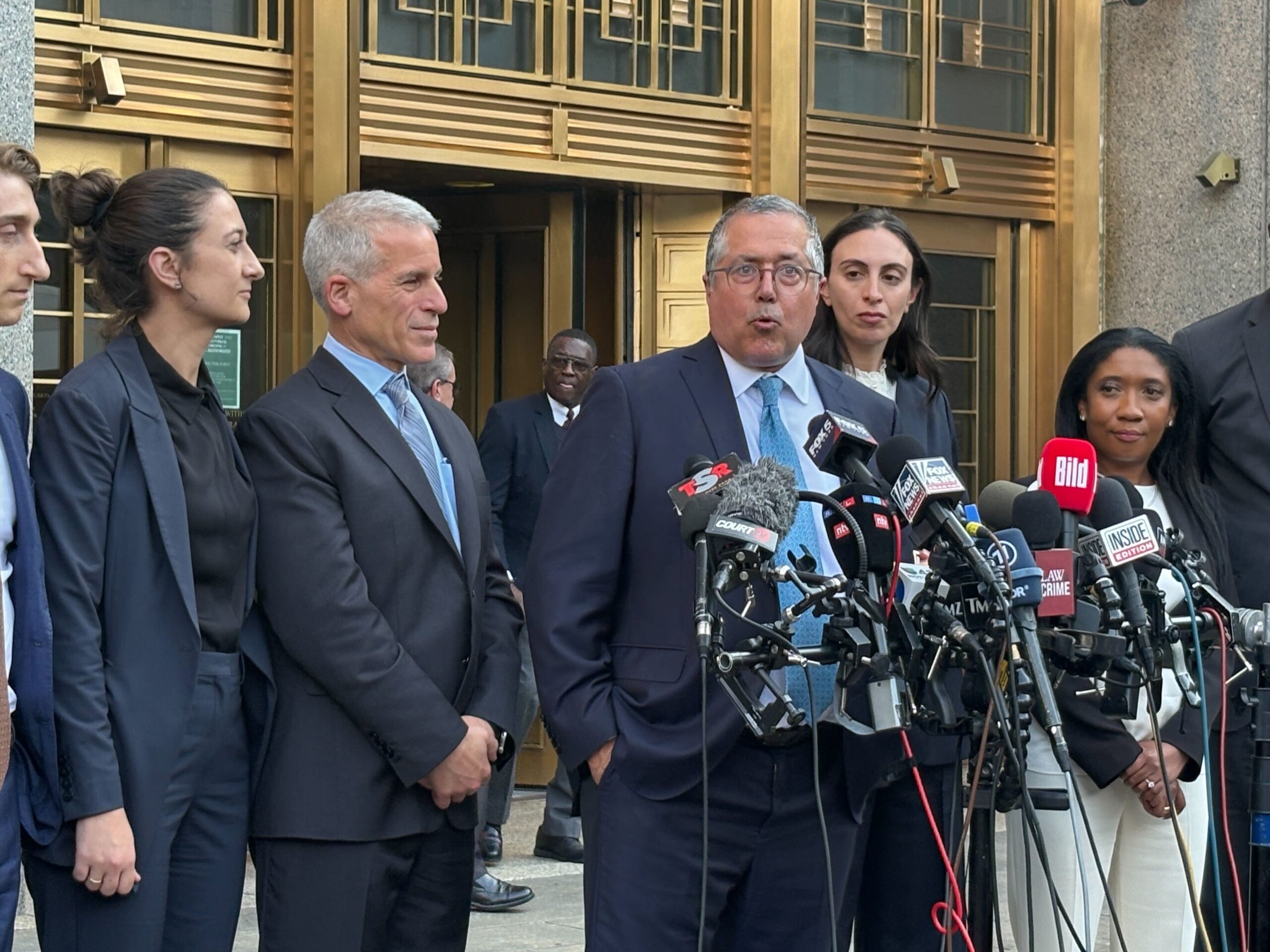 Defense attorney Marc Agnifilo speaks outside Manhattan federal court on Wednesday evening
