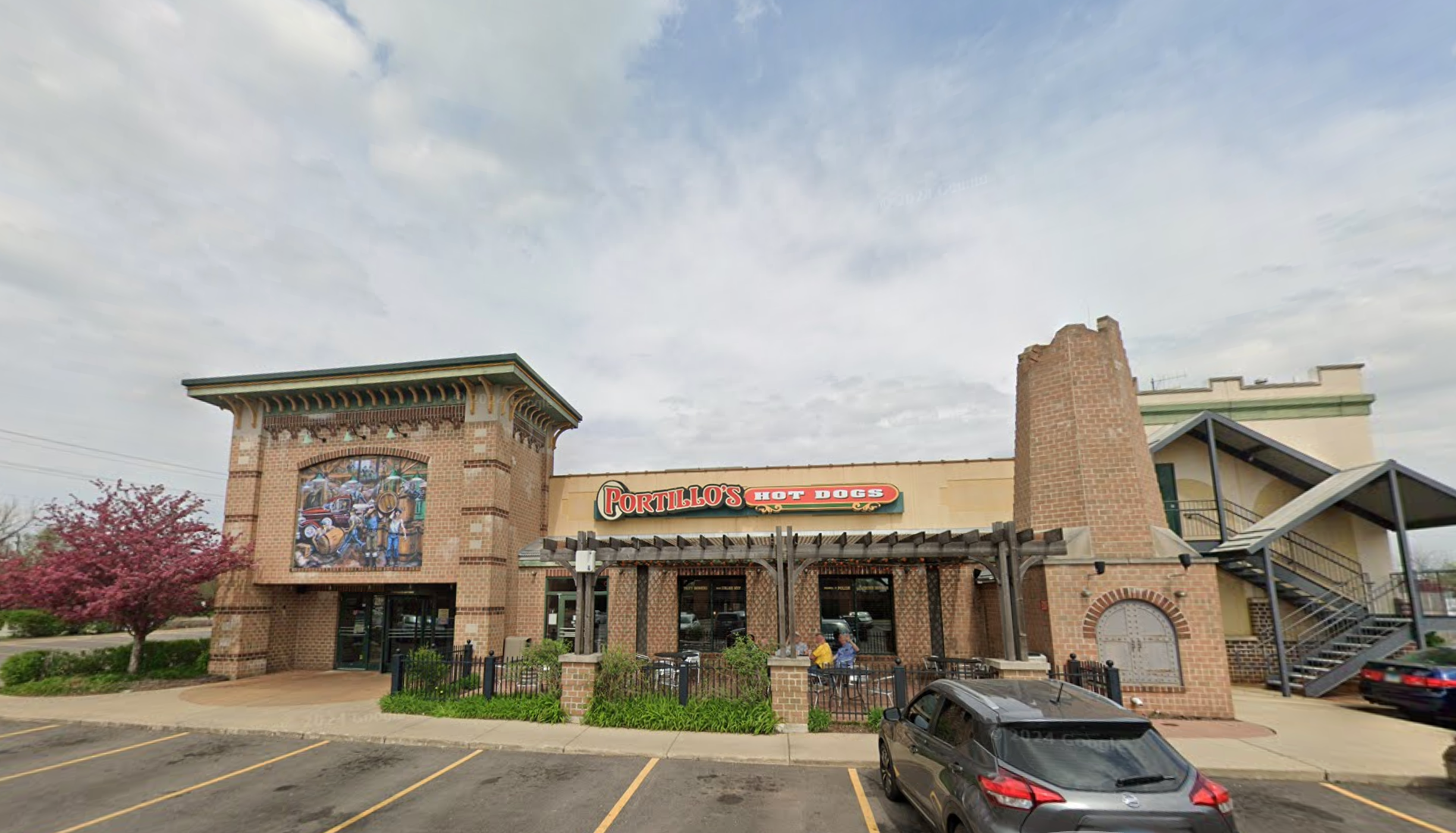 A 2-year-old boy was killed and 14 others were injured when a car crashed through the front of Portillo’s restaurant in Oswego, Illinois, Wednesday.