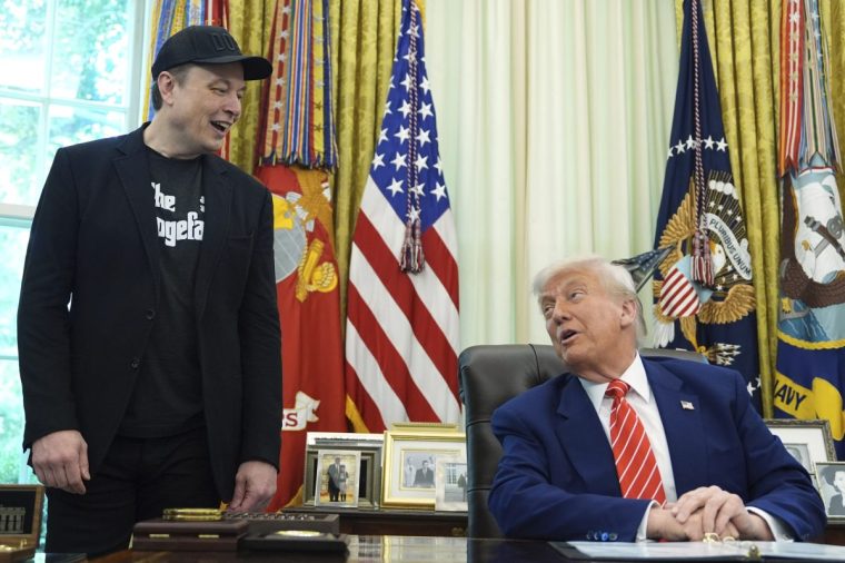 Donald Trump and Elon Musk in happier times. (Picture: Evan Vucci/AP)