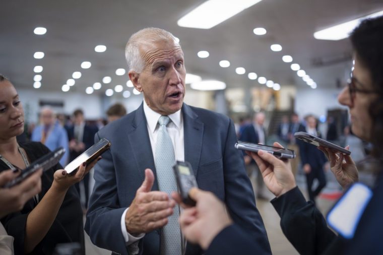 FILE ??? Sen. Thom Tillis, R-N.C., speaks with reporters at the Capitol in Washington, Sept. 25, 2024. (AP Photo/J. Scott Applewhite, File)