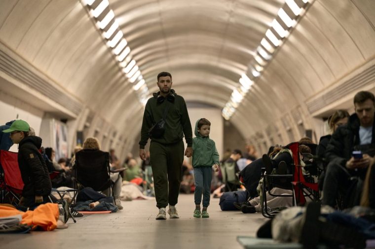 KYIV, UKRAINE - JULY 4: Local residents take cover in the metro station used as shelter during a mass drone and missile attack by the Russian Federation on the capital on Kyiv July 4, 2025 in Kyiv, Ukraine. Ukrainian authorities reported at least 23 people have been injured in the overnight drone attack on Kyiv. The attack also damaged railway infrastructure and set buildings and cars on fire in various districts throughout the city. (Photo by Kostiantyn Liberov/Libkos/Getty Images)