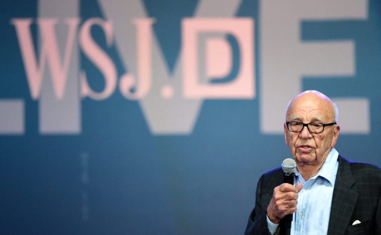 (FILES) Media magnate Rupert Murdoch addresses the audience on October 19, 2015 in Laguna Beach, California during the opening of 2015 WSJD Live. On July 17, US President Donald Trump threatened to sue The Wall Street Journal and owner Rupert Murdoch over a story about an alleged off-color letter he wrote to Jeffrey Epstein, amid lingering political fallout over his administration's handling of the late financier's sex trafficking case. The article in the Journal says the letter featuring a sketch of a naked woman and Trump's signature was part of a collection of notes for Epstein's 50th birthday in 2003. (Photo by Frederic J. BROWN / AFP) (Photo by FREDERIC J. BROWN/AFP via Getty Images)